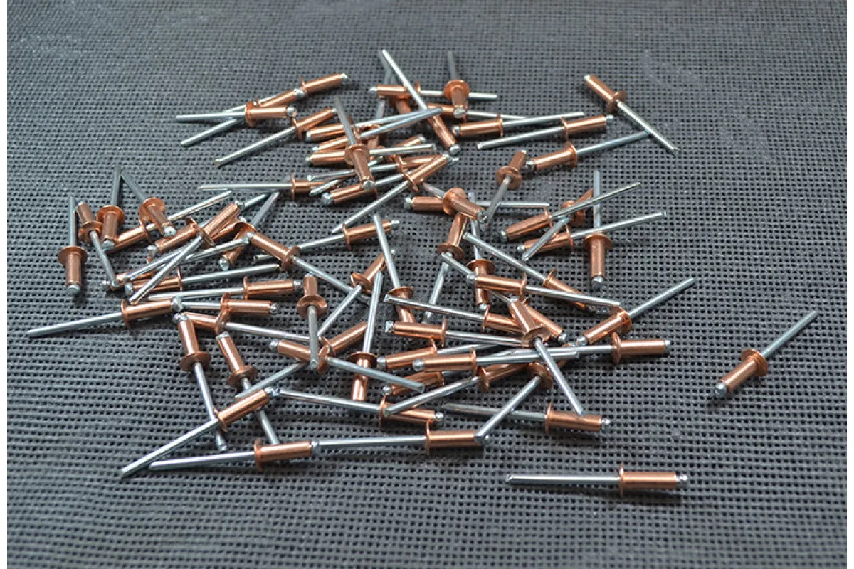 Заклепка Ф3.0 DIN 7337, мідь/сталь